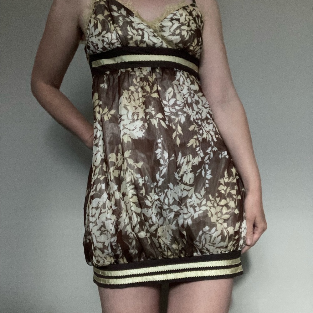 Brown and beige mini dress with leaf pattern